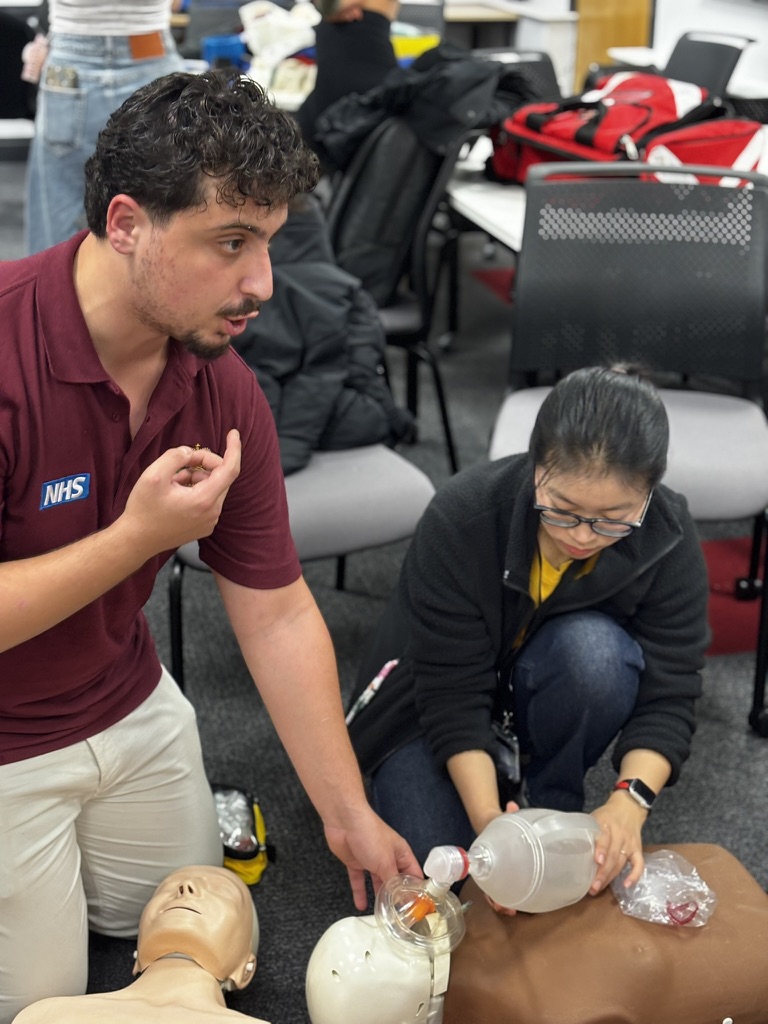 CFR member demonstrating CPR with bag-valve-mask on training mannequin
